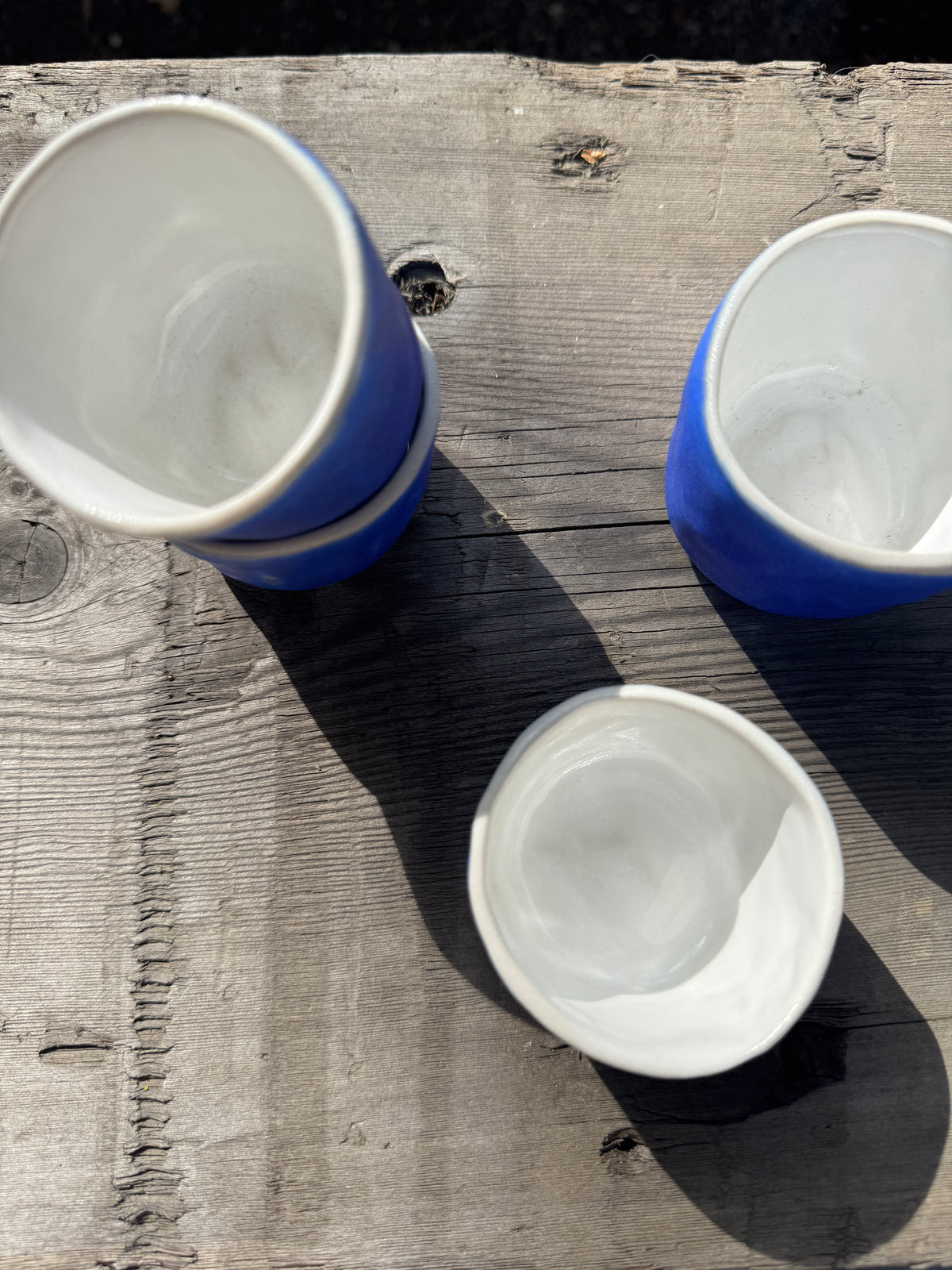 Hand made porcelain cups in cerulean blue