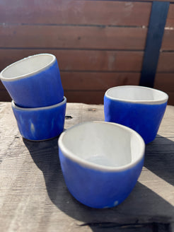Hand made porcelain cups in cerulean blue