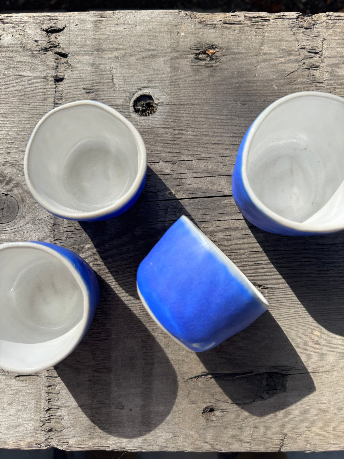 Hand made porcelain cups in cerulean blue