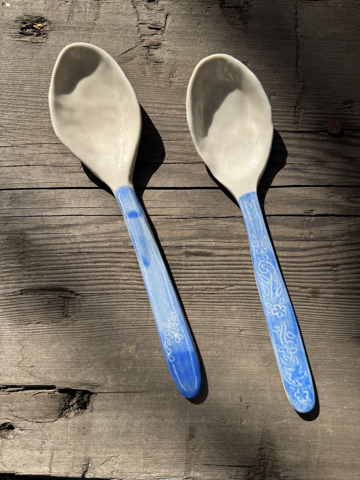 Porcelain spoon with carved handle
