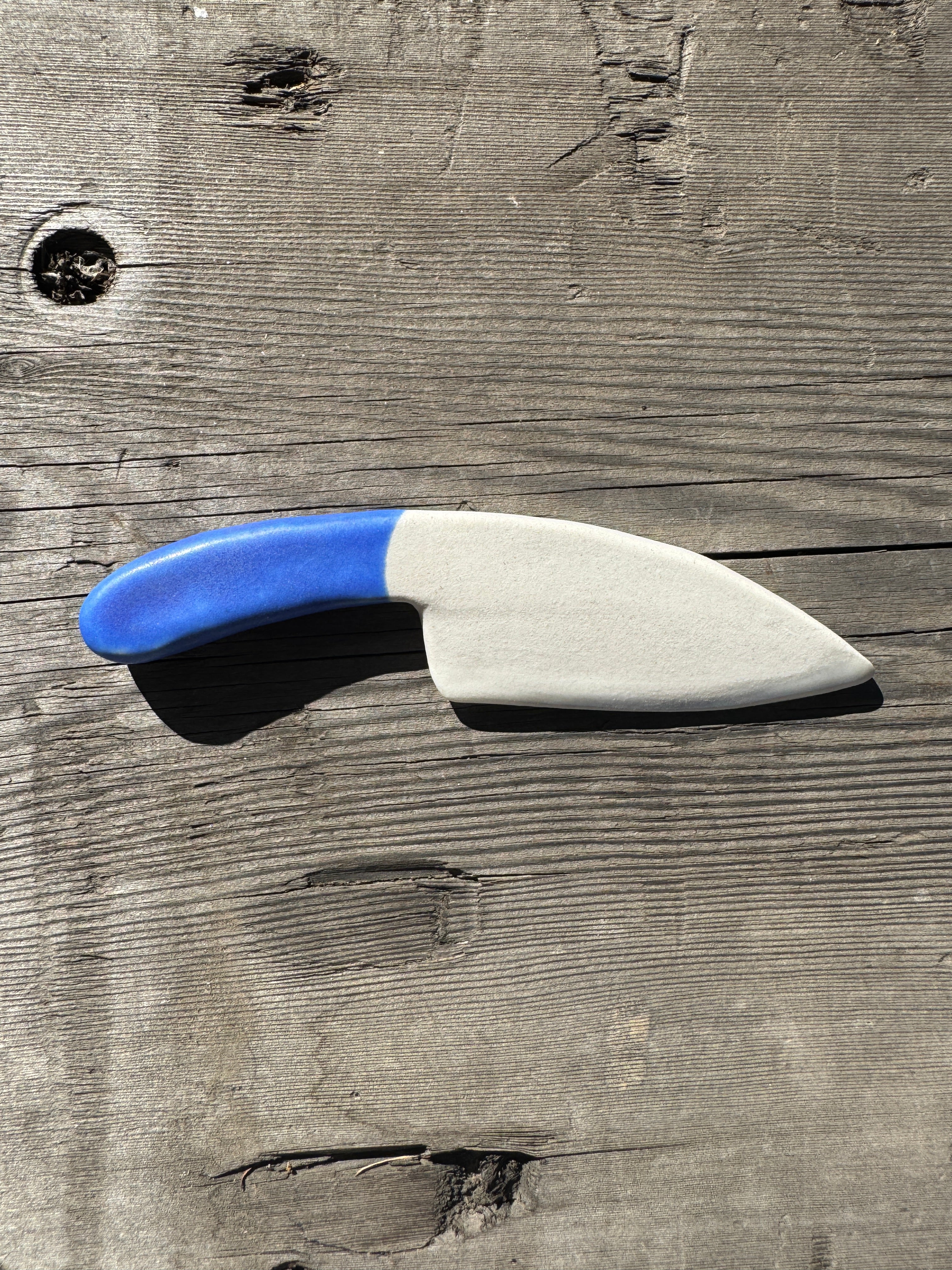porcelain cheese knife with blue handle