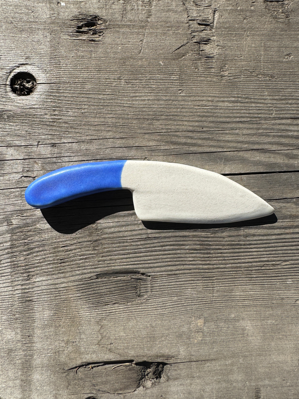 porcelain cheese knife with blue handle