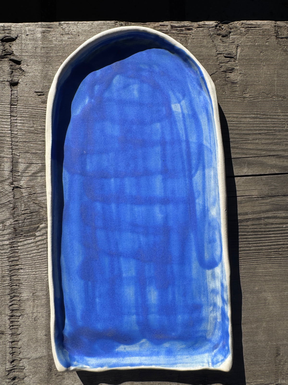 Hand formed porcelain tray in cerulean blue