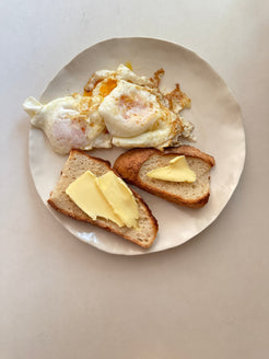 Porcelain breakfast plate with eggs and toast
