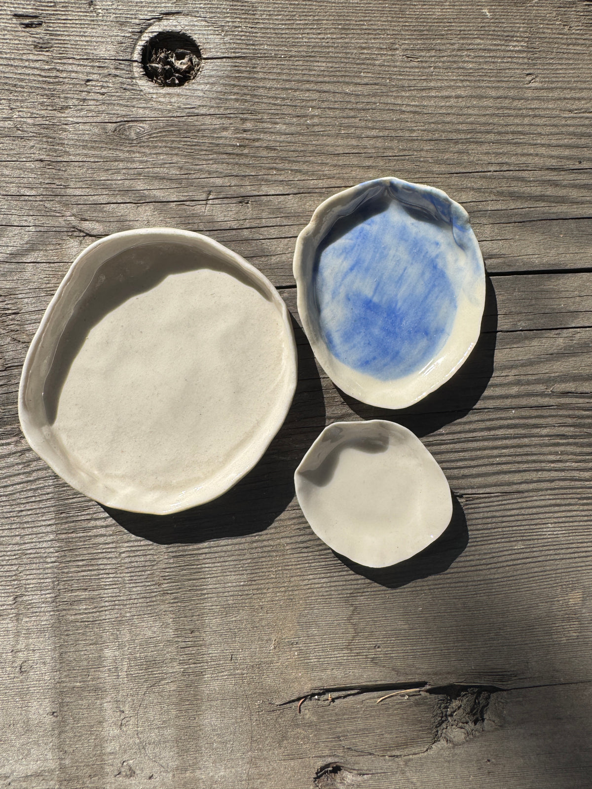 Trio of hand made porcelain mini plates