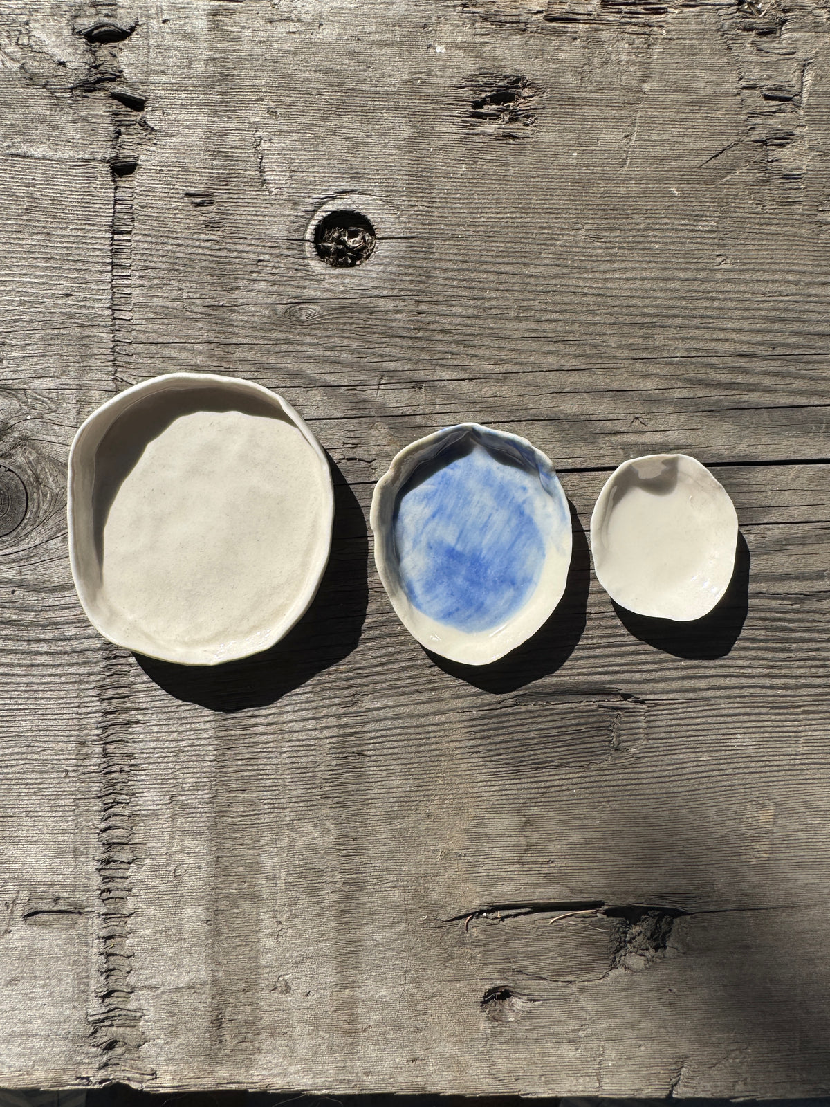 Trio of hand made porcelain mini plates