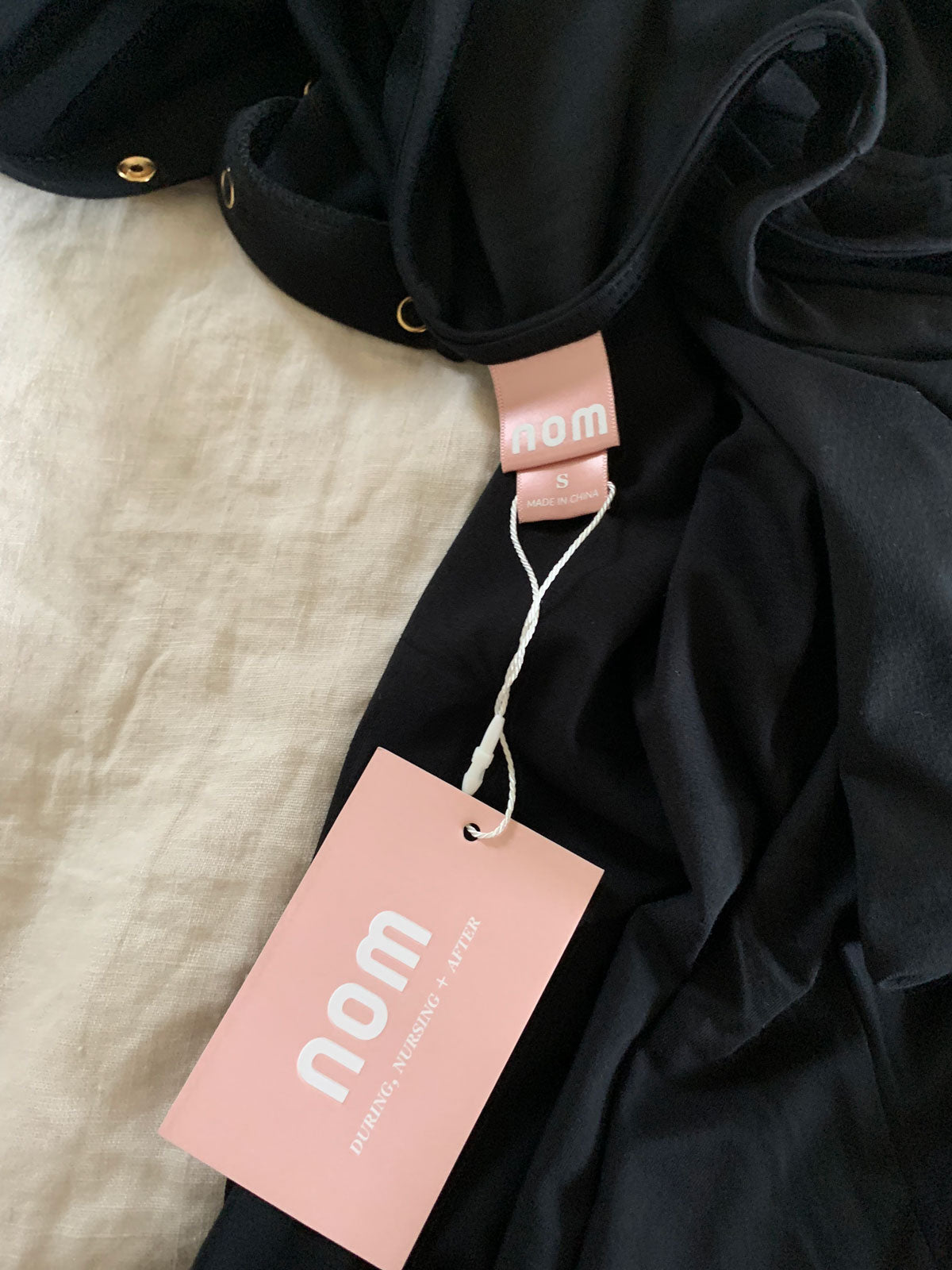 NOM Maternity hang tag design