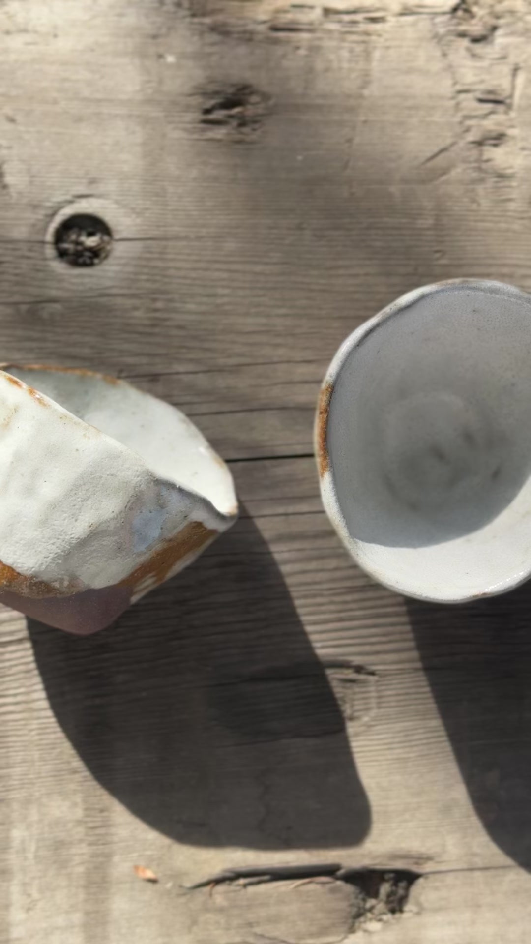 Pair of earthenware cups with white glaze